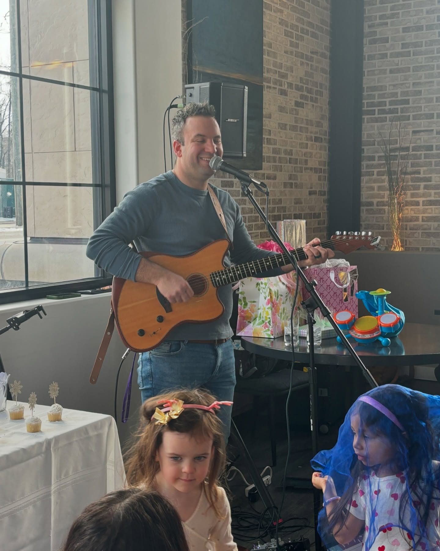 Jordan and children enjoying music